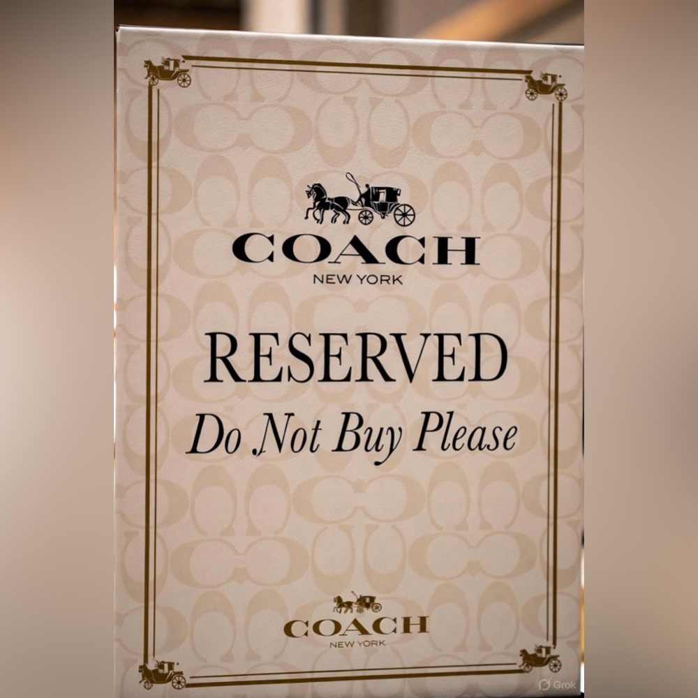THIS COACH WALLET IS RESERVED DO NOT BUY IT